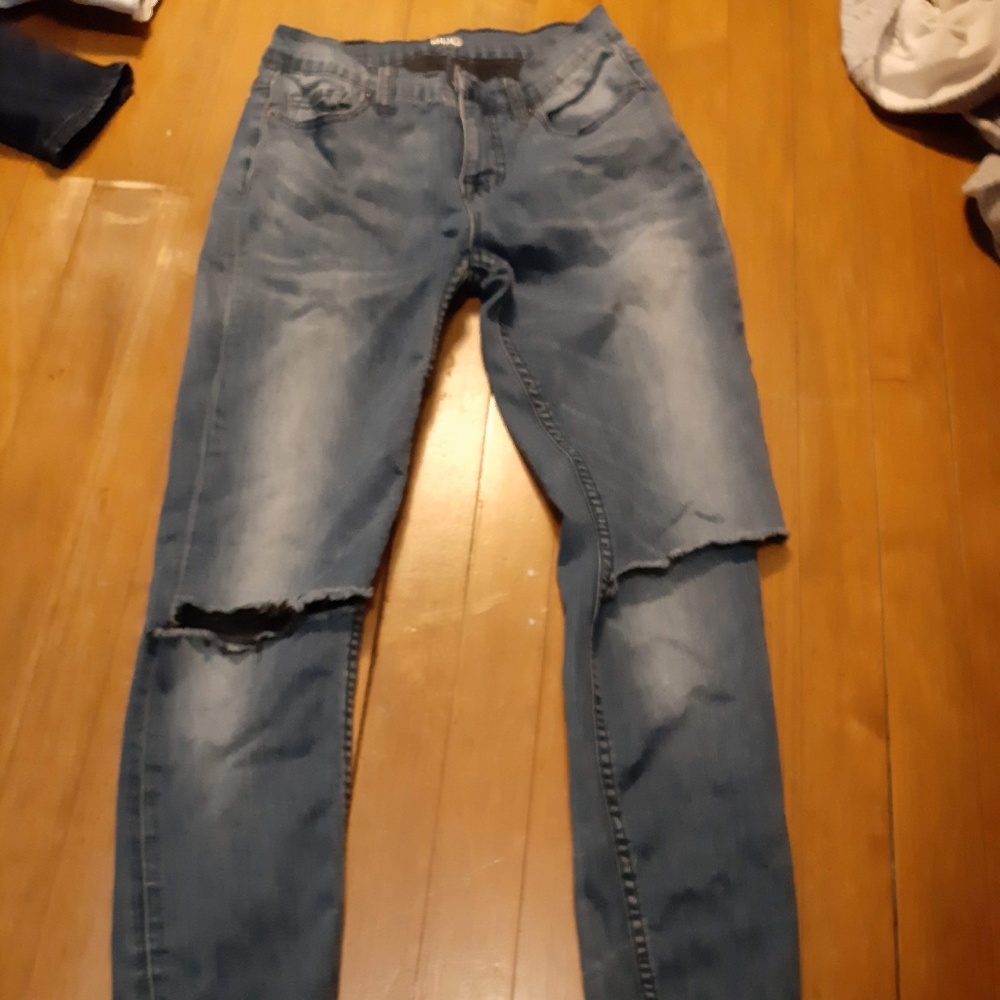 Ripped Knee Blue Jeans